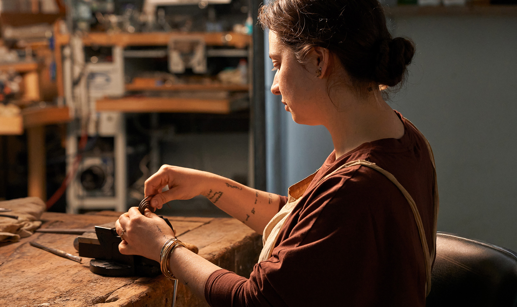 Joy Harvey working in her studio as part of Vacheron Constantin and The Met's artisan residency program.